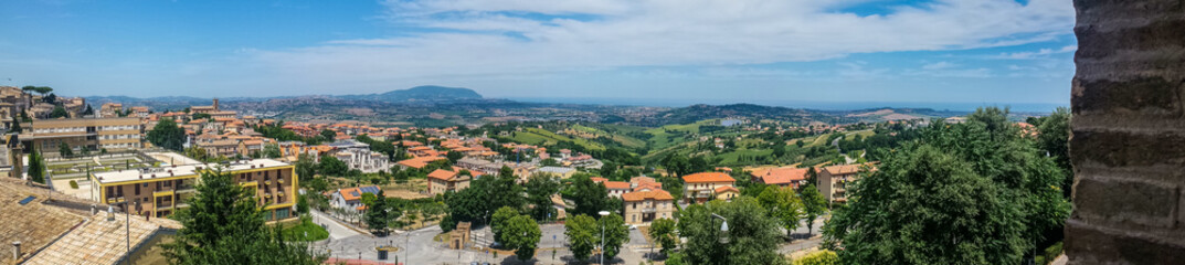 Fototapeta na wymiar Ultra wide view of Recanati and the hill of the Marche land