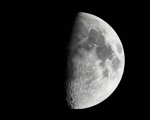 High detail photo of the Moon at 1600mm focal length on a clear sky night, first quarter phase,...