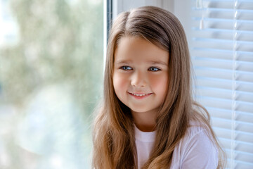 Fototapeta premium portrait of a little girl 4-5 years old smiling. 