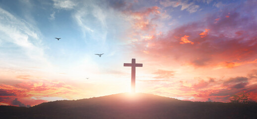 Christian wooden cross on the mountain  sunset background - obrazy, fototapety, plakaty