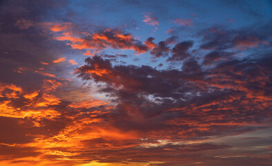 Dusk sky in the evening with colorful sunlight clouds on twilight.