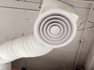 Air Ventilating tube installed on the ceiling of the office building or factory.