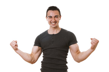 muscular young man celebrating success in winner pose with flexed muscles and clenched fists