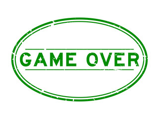 Grunge green game over word oval rubber seal stamp on white backgoround