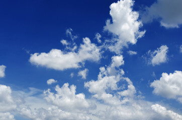 beautiful blue sky and white fluffy cloud horizon outdoor for background.