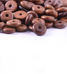 Wooden beads close-up  on white background. Close up, macro.