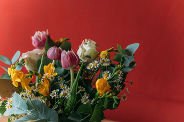 A bouquet of flowers on a bright background