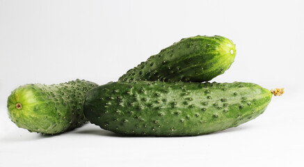 Fresh cucumbers. Isolated on a white background. Side view. group