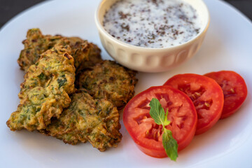 Traditional Turkish Zucchini Mucver. Mucver is a Turkish fritter or pancake, made from grated zucchini, egg and flour