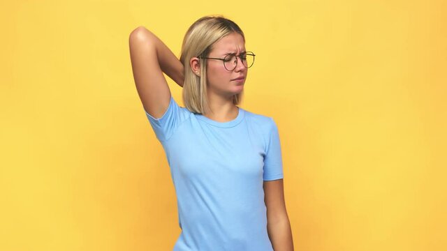 Young blonde caucasian woman suffering neck pain due to sedentary lifestyle