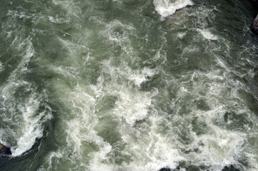 Fototapeta na wymiar Raging river waters texture background