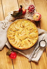 Homemade Apple Pie on rustic background, top view