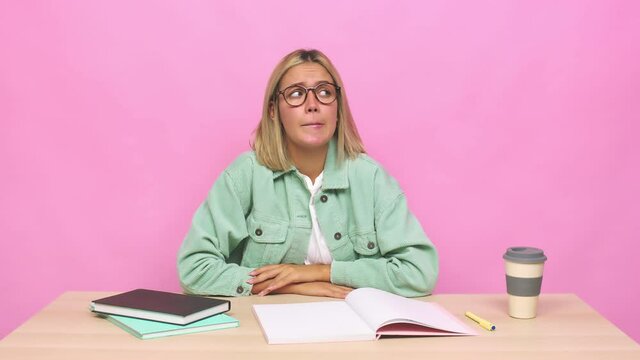 Young blonde caucasian woman confused, feels doubtful and unsure