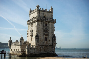 Fototapeta na wymiar View of the medieval Belem tower in border river at Lisbon Portugal