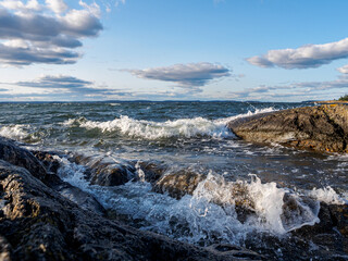 Waves crashing over the rocks n the shore
