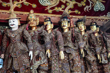 Traditional handicraft puppets are sold in a market at Mandalay, Myanmar.