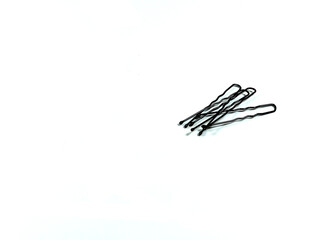 Black hairpins isolated on white background