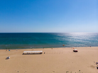 flight over the sandy city beach