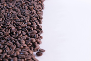 Dark coffee beans isolated background