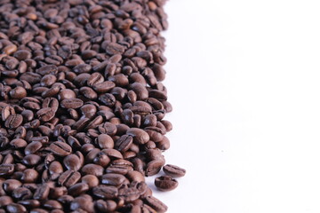 Dark coffee beans isolated background