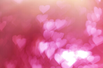 Defocused blurred heart shaped lights. Valentines Day background.