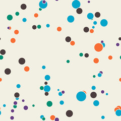 Abstract seamless pattern with colorful chaotic small circles. Infinity dotted messy geometric pattern. Random polka dot. Vector illustration.