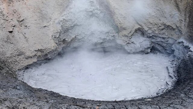 Hot exploding mud of Mud Volcano in Yellowstone National Park