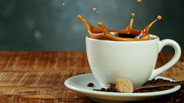 Falling sugar cane into coffee cup, super slow moton at 1000 fps.