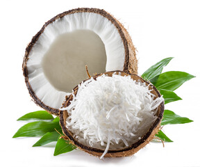 Cracked coconut fruit with white flesh and shredded coconut flakes isolated on white background.