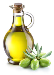 Green natural olives with bottle of olive oil isolated on a white background.