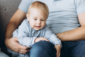 Fototapeta premium Little infant baby in fathers hands