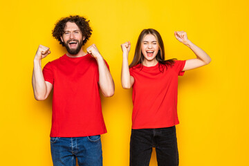 Portrait of two nice attractive couple having fun lottery win winner best luck lucky isolated over...
