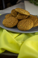 oat biscuits on a plate with a yellow accent