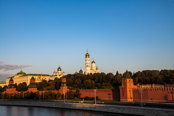 Naklejka premium cityscape with ancient buildings and skyscrapers at sunrise