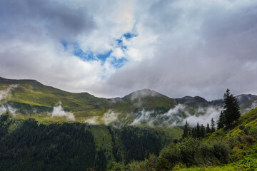 fine white fog in the mountains while hiking