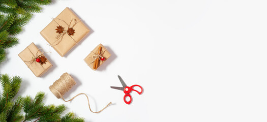 Christmas flat lay banner with copy space mockup. Present boxes and fir tree branches composition