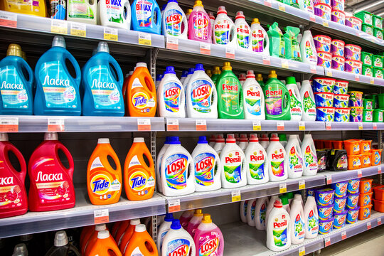 Different washing powder on the shelf at the store