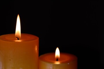 Candle black background of mourning funeral moment of silence