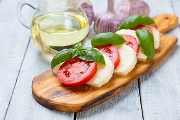 Italian caprese salad with mozzarella cheese