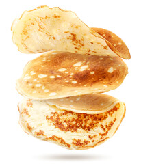 Thin pancakes are flying on a white background. Isolated - obrazy, fototapety, plakaty