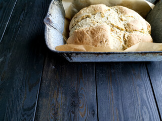 Home made bread on black table