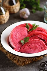 Homemade sauerkraut with beets and garlic. Organic food.
