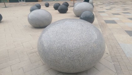 Fototapeta na wymiar ball on the stone