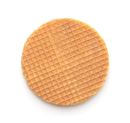 Top view of round freshly baked stroopwafel isolated on white