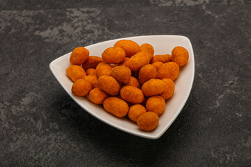 Spicy peanut heap in the bowl