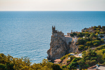 Yalta / Crimea - 22 Sep 2020: Castle of Swallow's Nest at the Black Sea coast. Beautiful tourist place in Crimea.