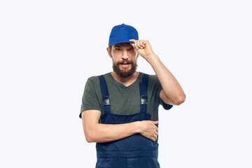 Worker man uniform delivery service emotions studio light background