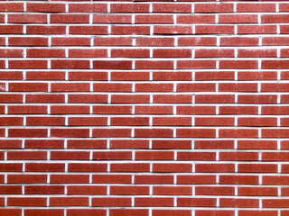 Background texture. Red brick wall with white seams