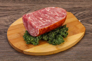 Beef ham piece over board