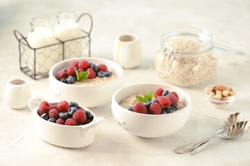 Oatmeal with fresh blueberries and raspberries. Healthy breakfast.